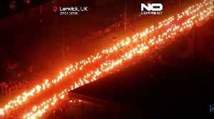 Up Helly Aa: Hundreds of torchbearers gather on Scottish island for Viking fire festival