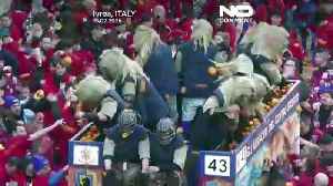 Streets of Ivrea explode with flying oranges in a three-day carnival revolt