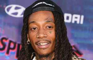 Wiz Khalifa was left devastated by his father's 'sudden' death