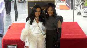 Monica and Brandy pose together at the unveiling of Brandy's star on the Hollywood Walk of Fame