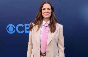 Drew Barrymore has tearfully revealed her body insecurities after undergoing two c-sections