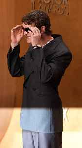 The Photographers Were Not Happy When Connor Storrie Put His Shades On On The Red Carpet