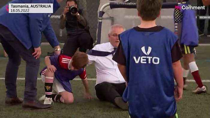 Australia: Prime Minister Scott Morrison crashes into child during football match on campaign trail