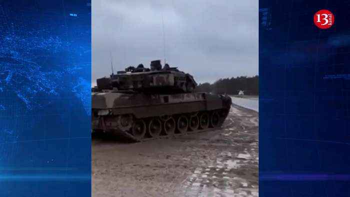 German defense minister boards Leopard 2 tank to be sent to Ukraine