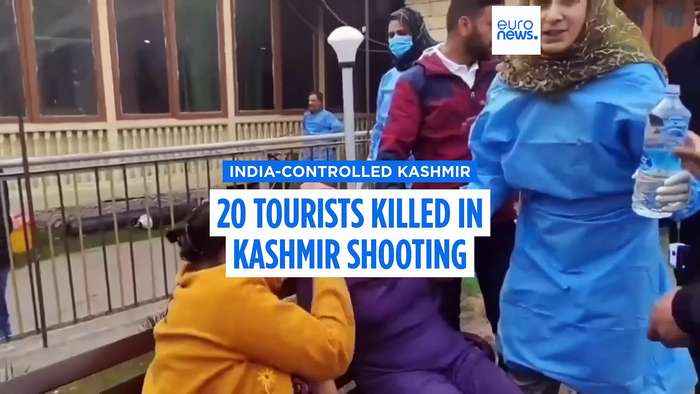 At least 20 tourists killed as gunmen open fire in India-controlled Kashmir, police say