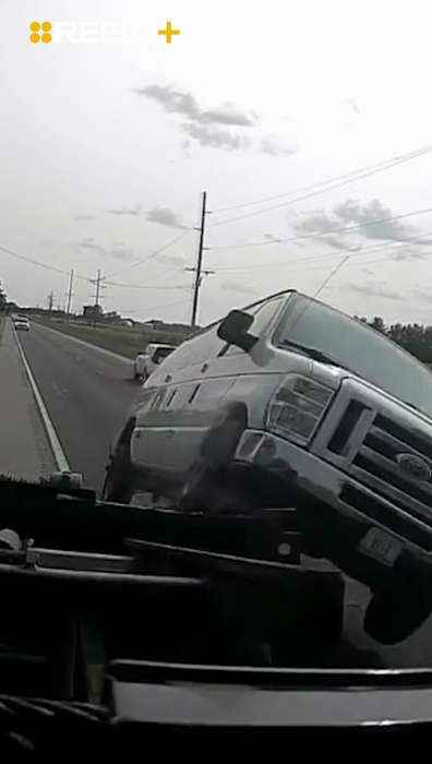 Van Hits Tow Truck—Launches Into the Air Like a Movie Stunt