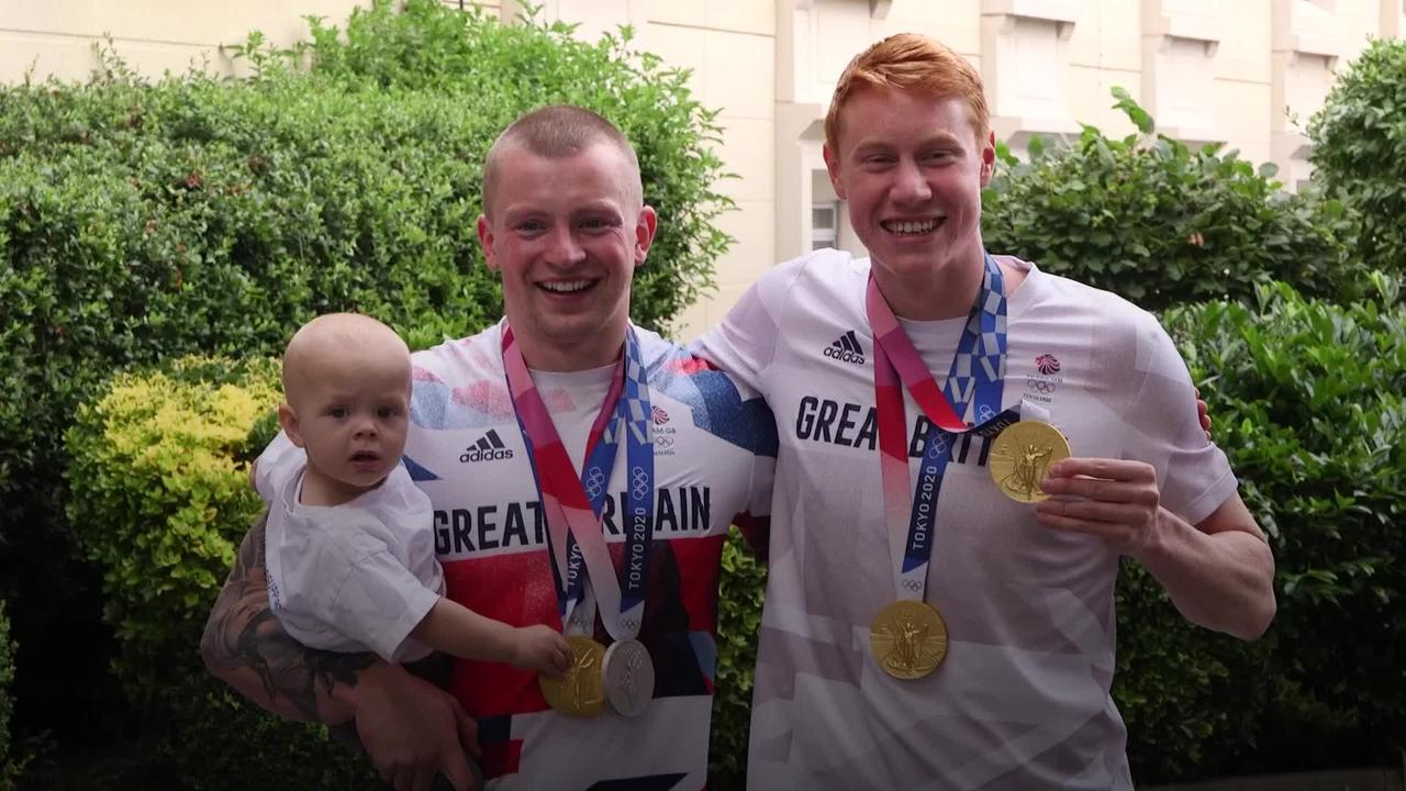 Adam Peaty and Tom Dean arrive back in UK after medal success in Tokyo