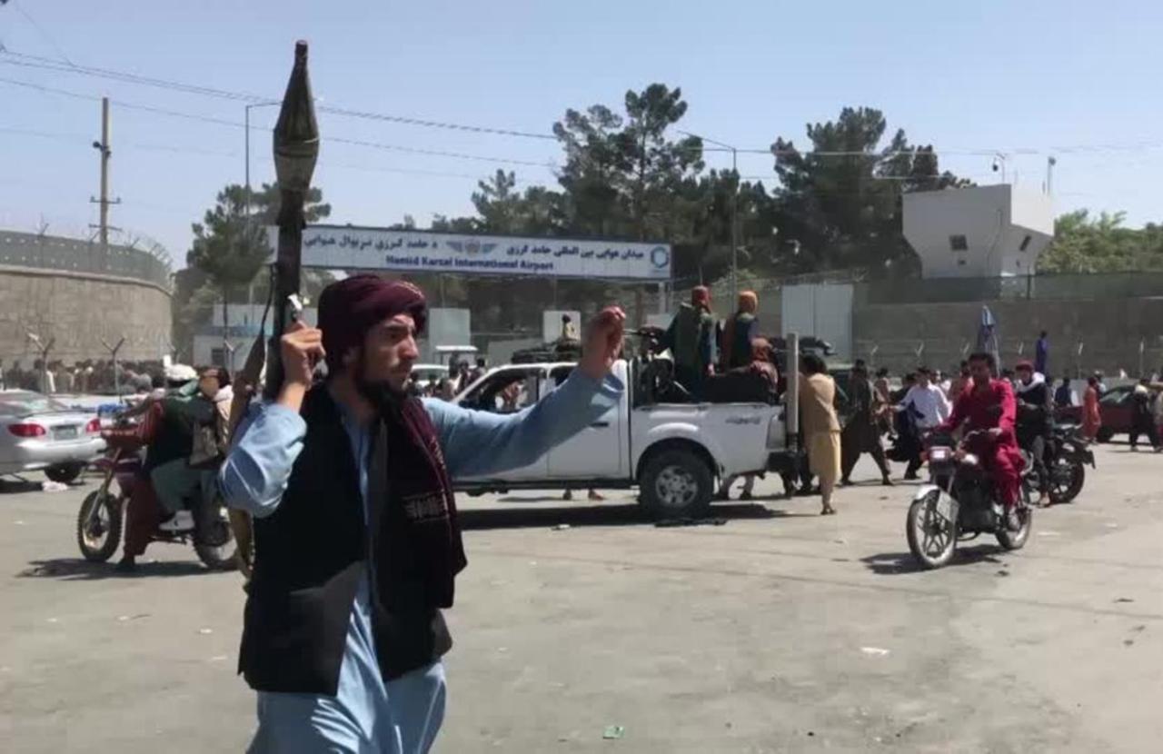 Taliban take civilian weapons, airport in turmoil