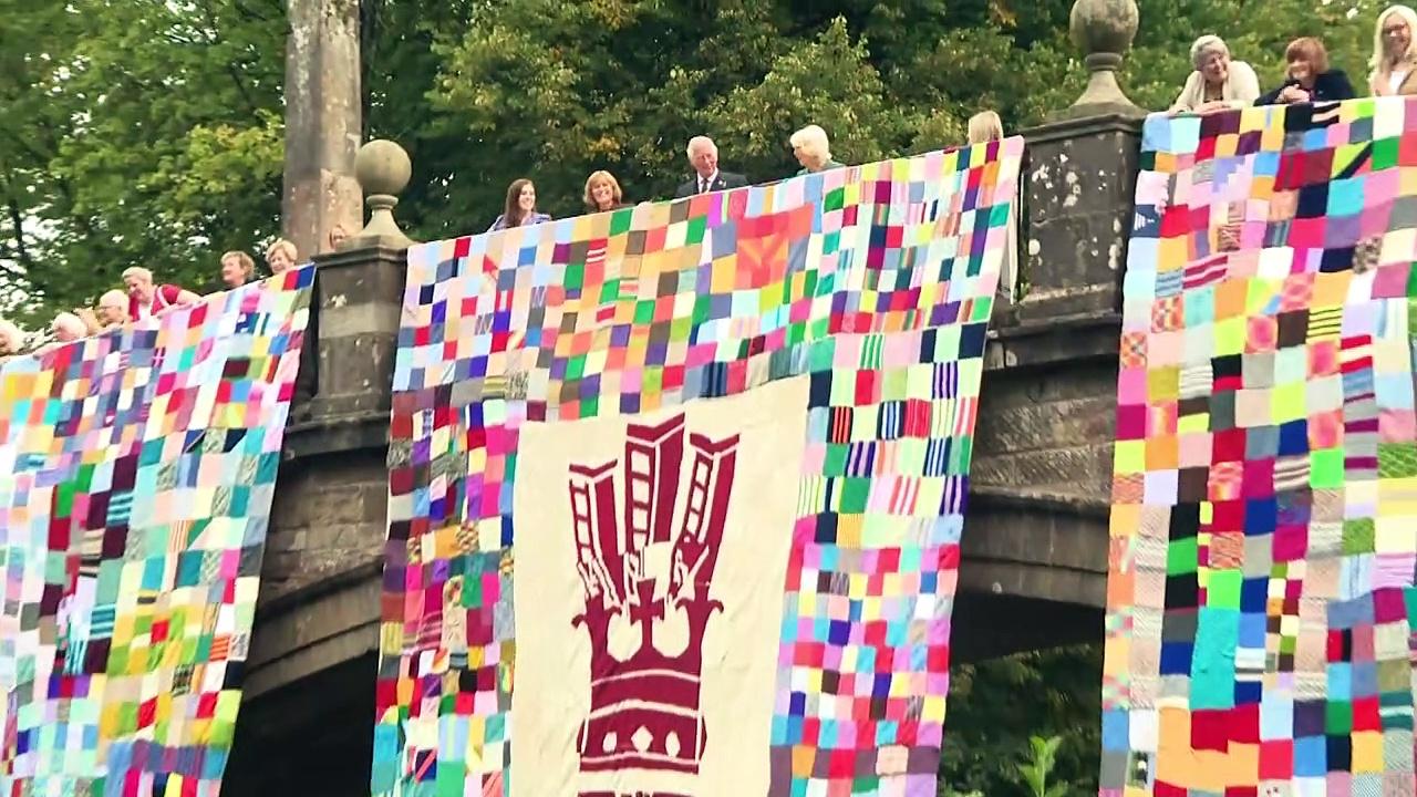 Charles and Camilla unveil gigantic knitted artwork