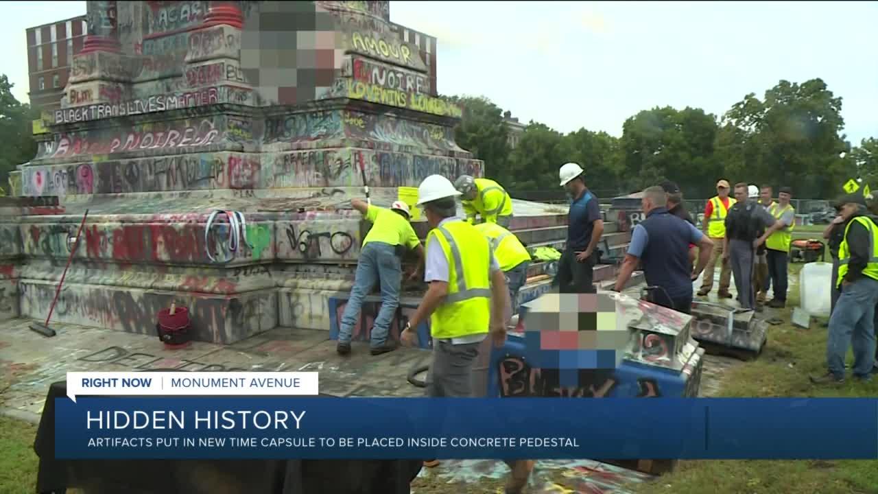 Crews plant new time capsule into Lee monument base