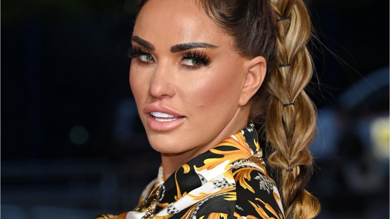 Katie Price rubbishes claims that she dumped fiance Carl Woods