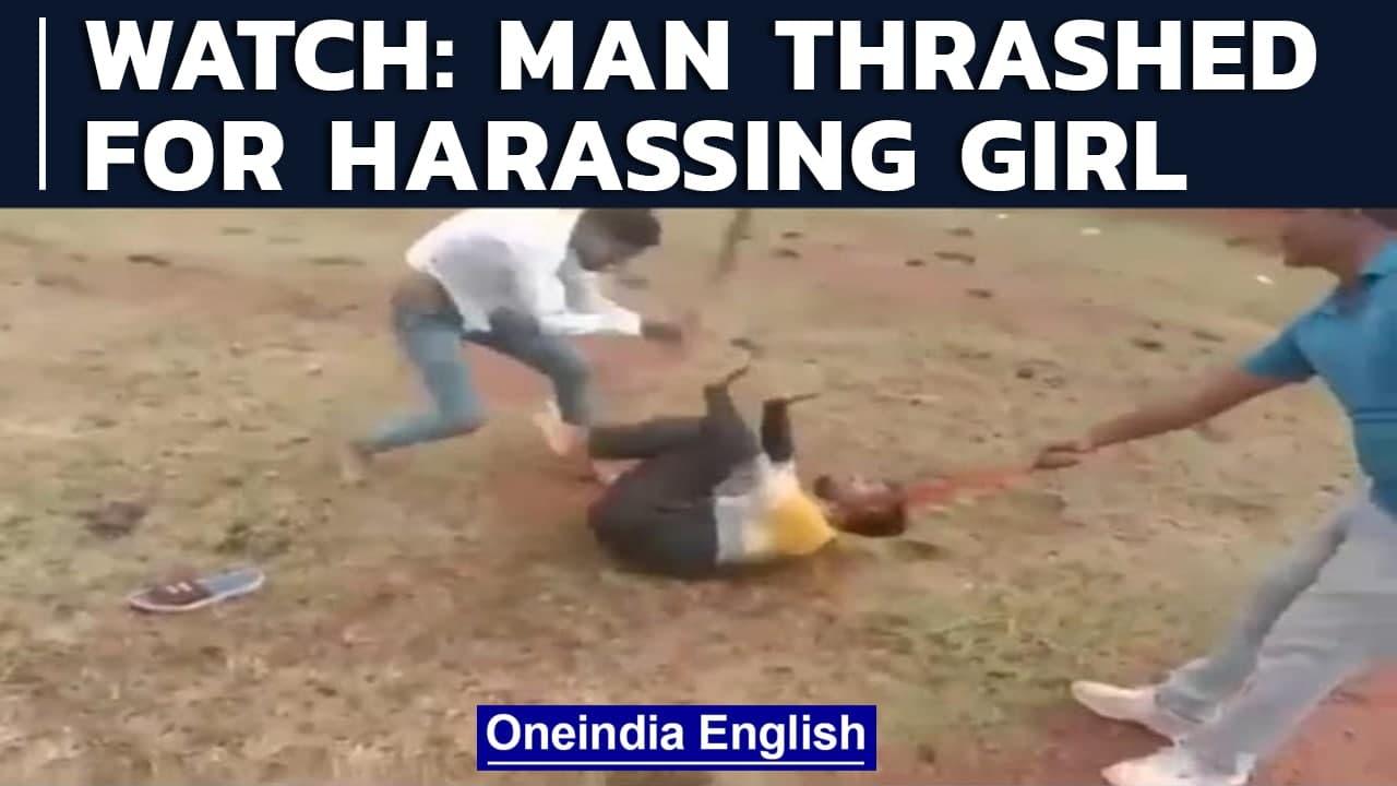 MP man thrashed by relatives of a girl who he allegedly harassed in Rewa | Watch | Oneindia News