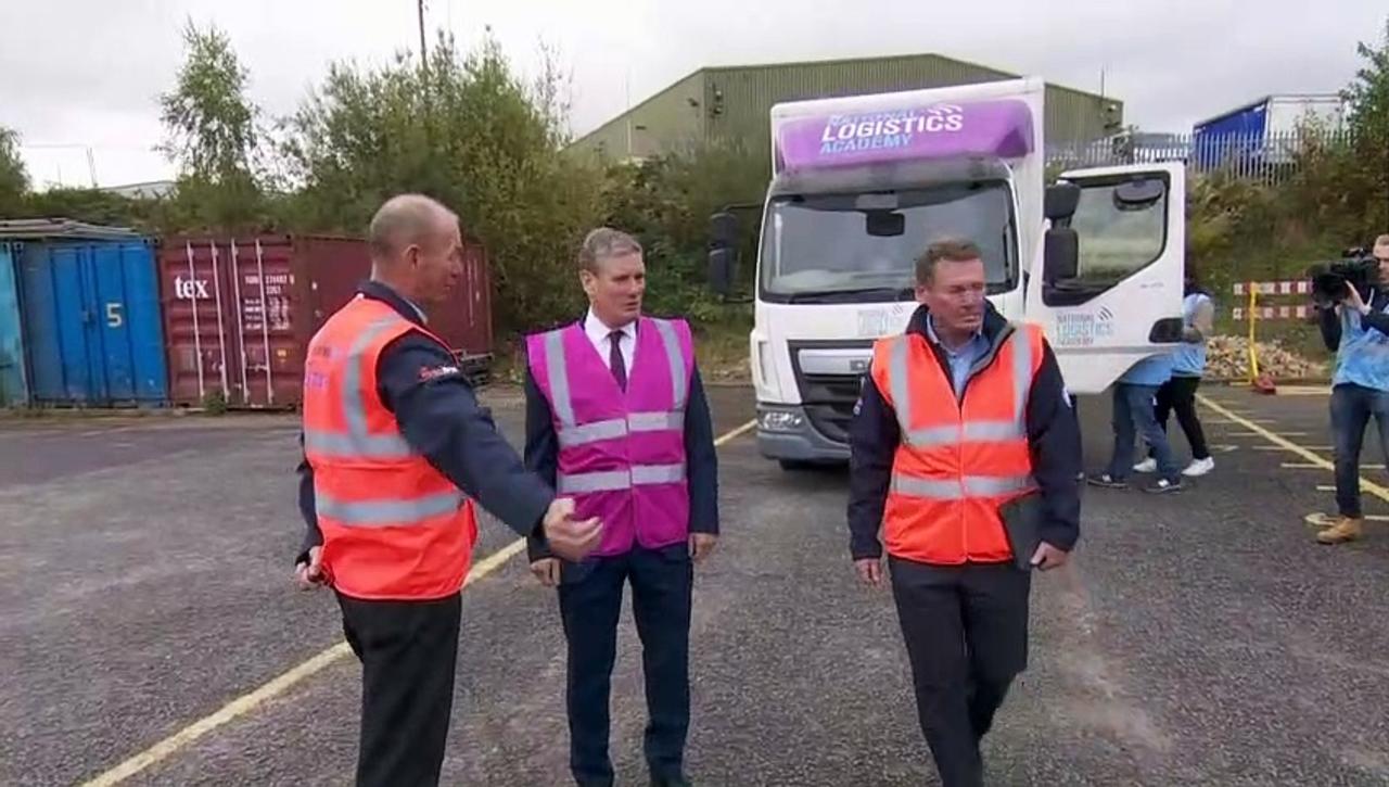 Keir Starmer drives HGV during visit to training centre