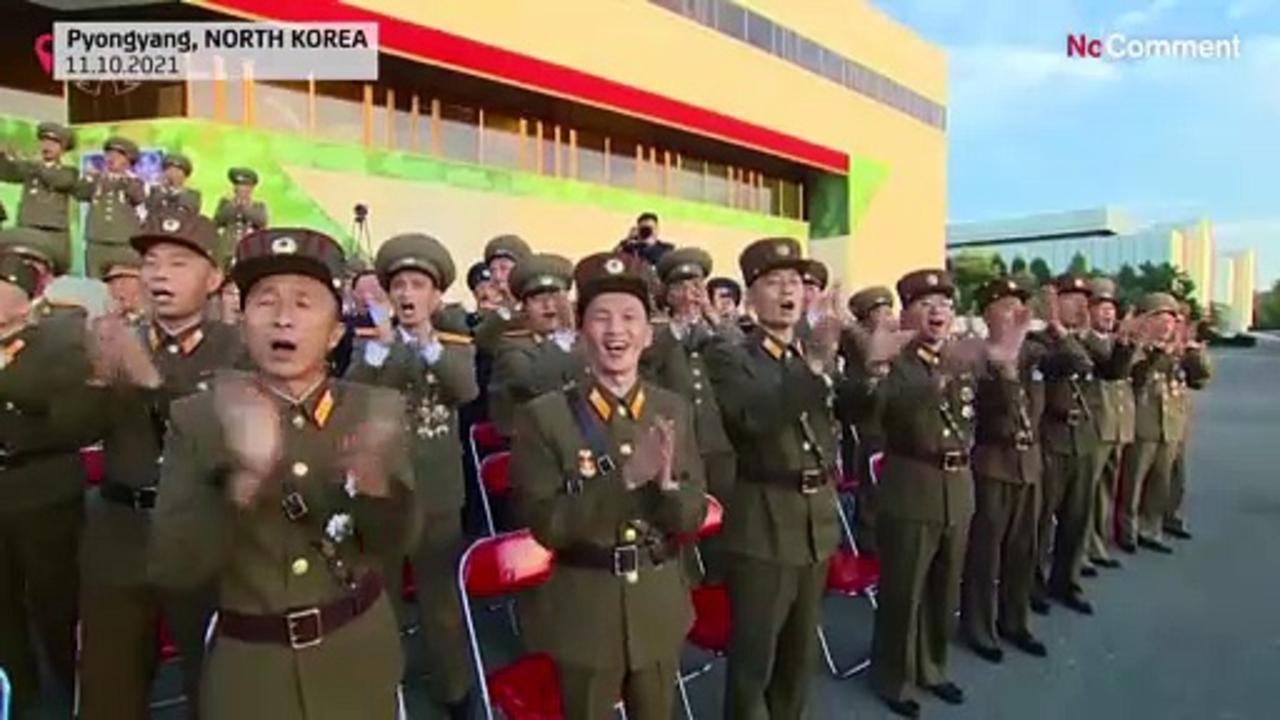 Kim reviews powerful missiles at weapon convention