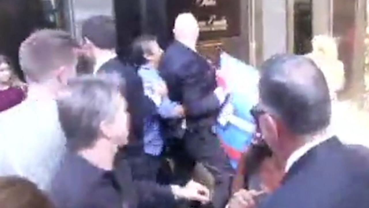 Video shows altercation between Trump's security and protester