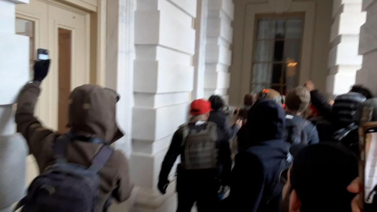 New video shows first protestors to breach Capitol on January 6