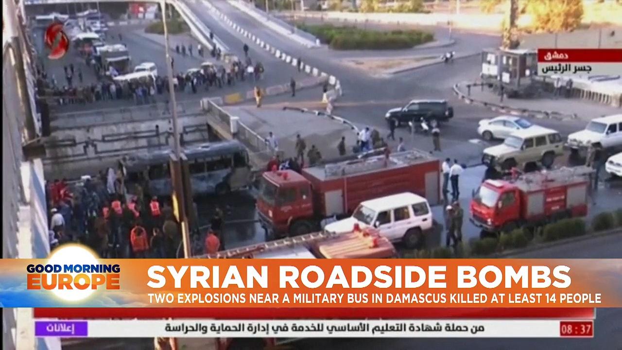 Roadside bombs hit military bus in Syrian capital, kill 14