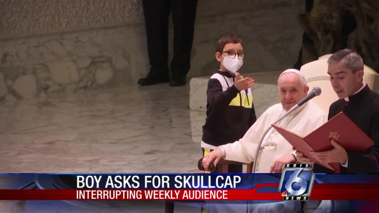 10-year-boy asks Pope Francis for his skullcap during services