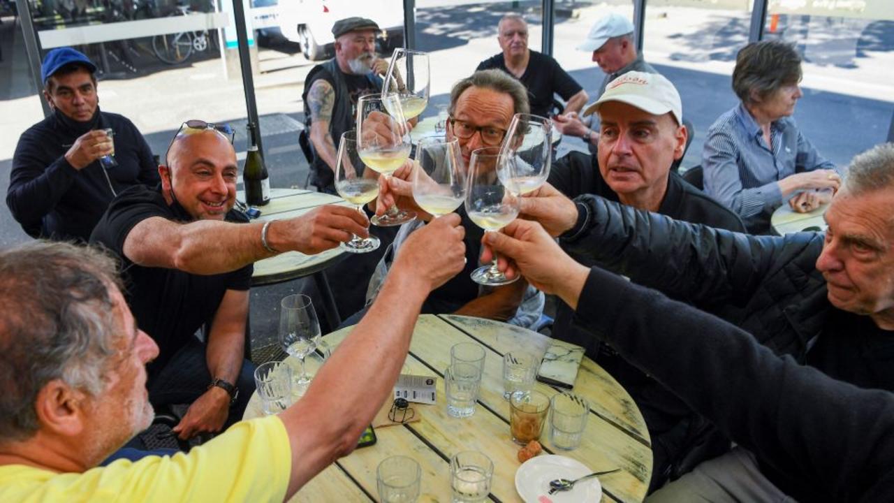 Melbourne residents raise a glass to end of Covid lockdown