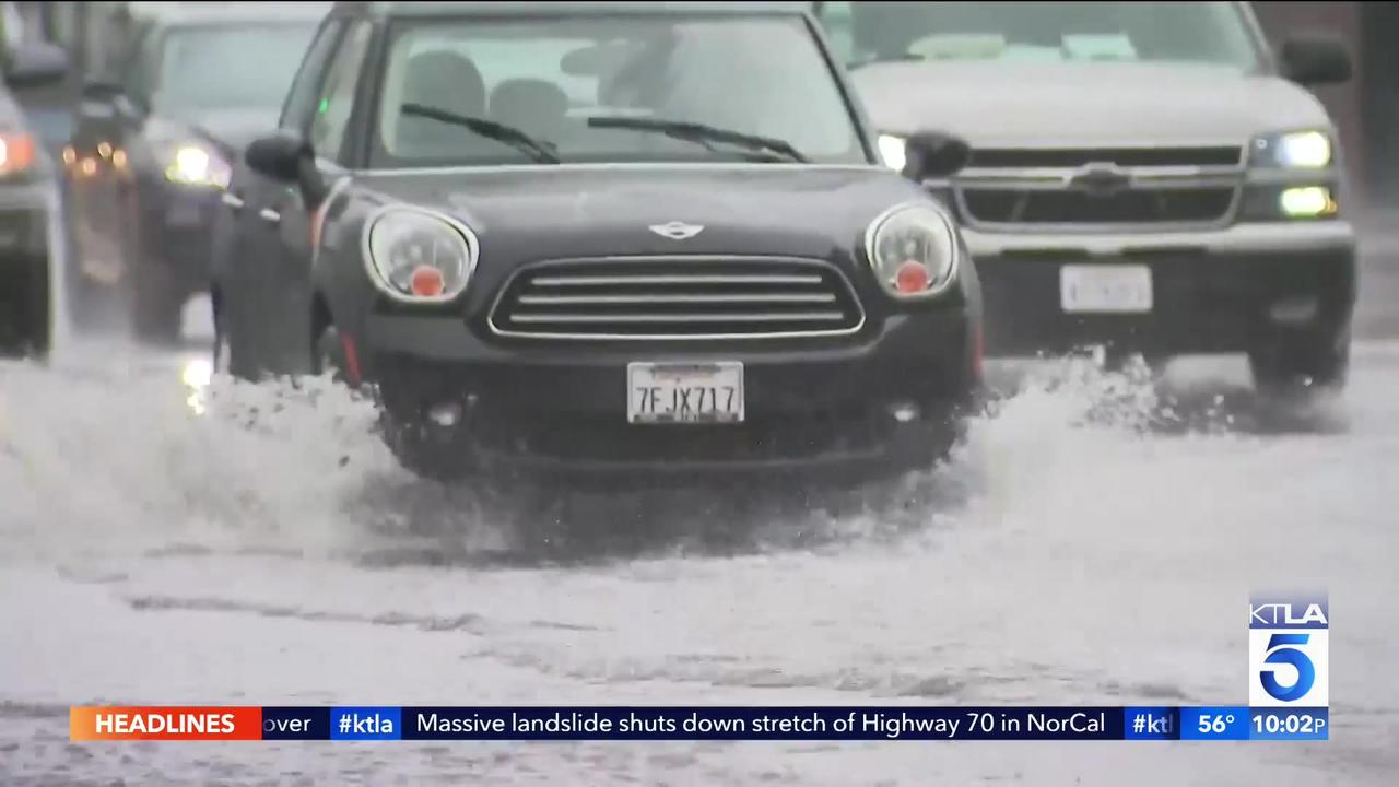 Atmospheric river brings heavy rain, localized flooding, downed trees to Southern California