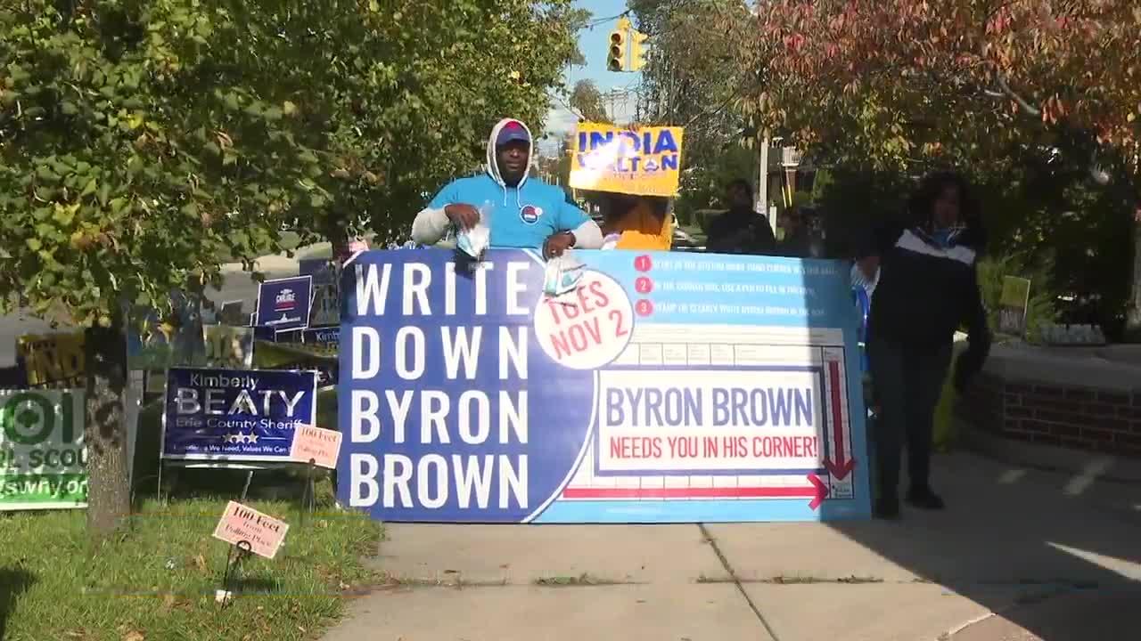 Mayoral campaigns continue outside polling places on Election Day