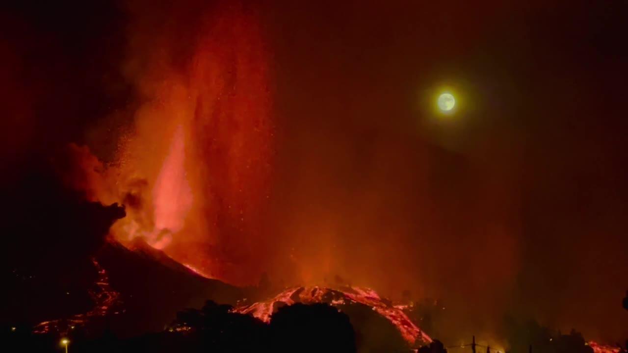 Epic slow motion night footage of erupting volcano