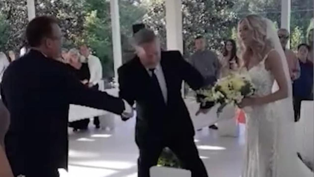 Father-of-the-bride invites daughter's stepdad to walk her down the aisle.