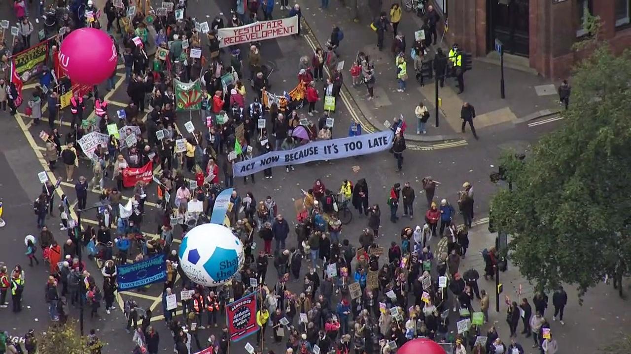 Climate change protesters march across central London