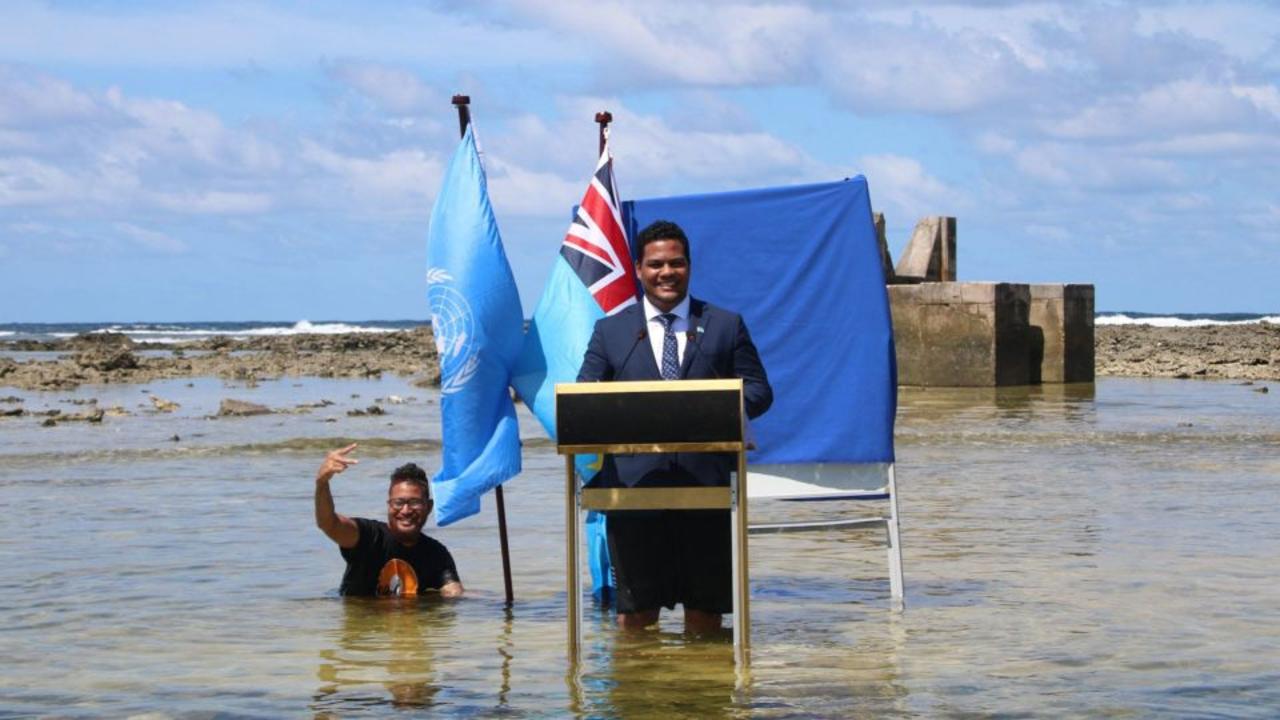 Hear the story behind iconic image of minister's speech in the sea