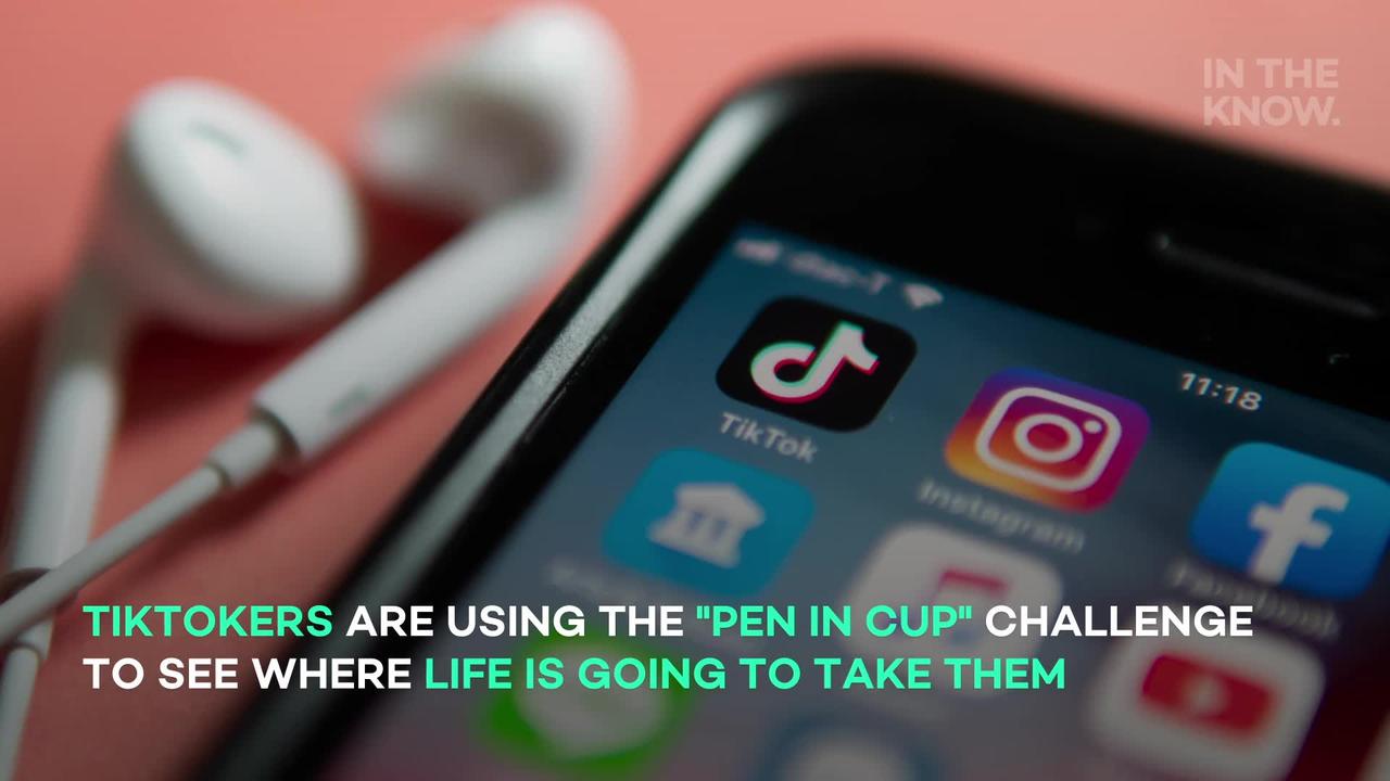 Here's why TikTok users are obsessed with throwing pens at cups