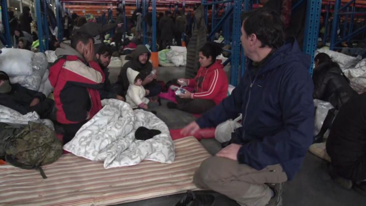 Reporter shows inside processing center holding migrants on Poland-Belarus border