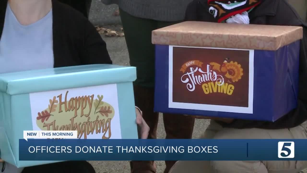 Corrections probation officers donate and deliver Thanksgiving boxes