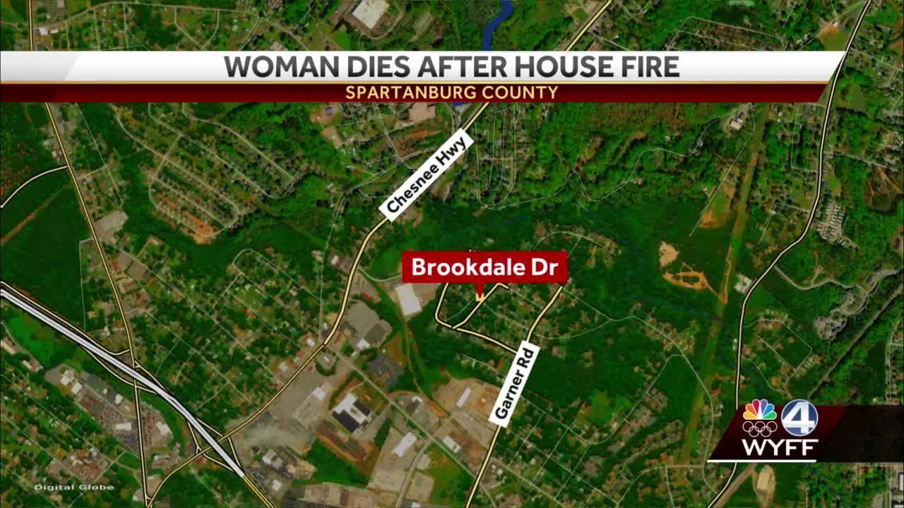 Woman dies following house fire, coroner says