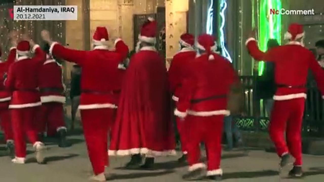 Santa Claus roams Christian town of Iraq, 'putting smiles on children's faces'