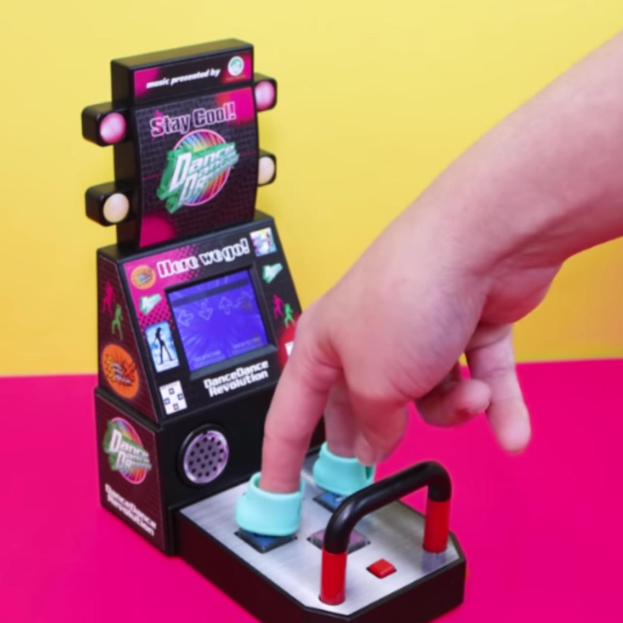 This is a tiny Dance Dance Revolution game for your fingers!