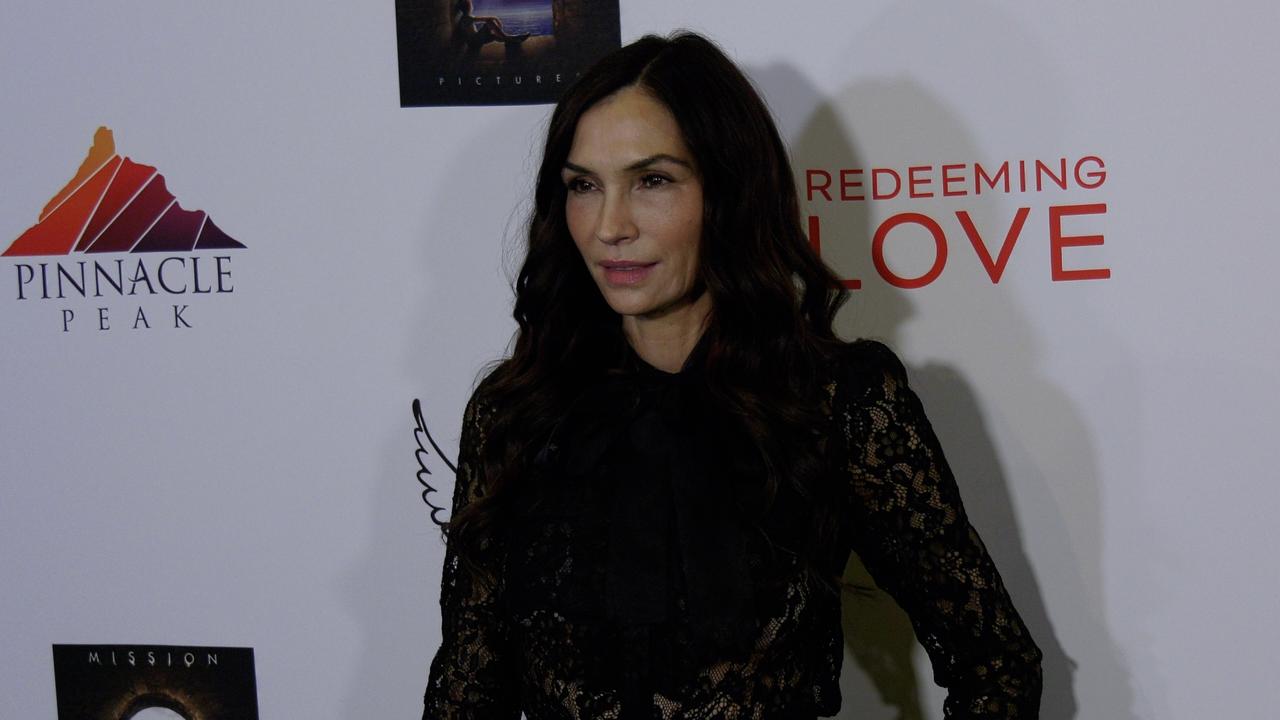 Famke Janssen attends the ‘Redeeming Love’ film premiere red carpet in Los Angeles
