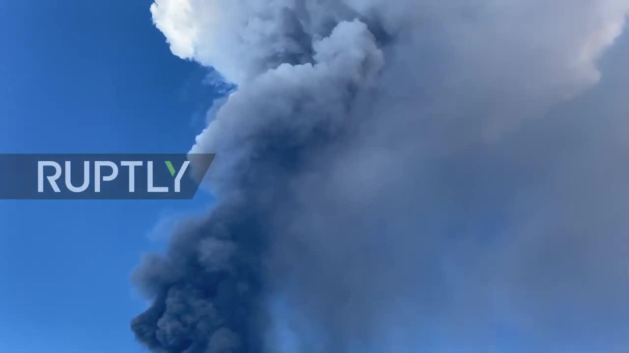 Italy: Spectacular eruption from Mount Etna sends lava fountain and massive ash column into sky