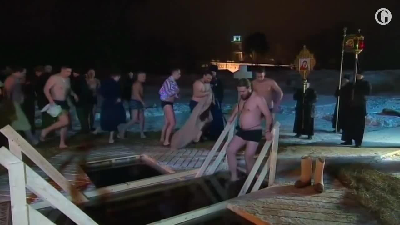 Russian president Vladimir Putin braves subzero lake to mark#shorts