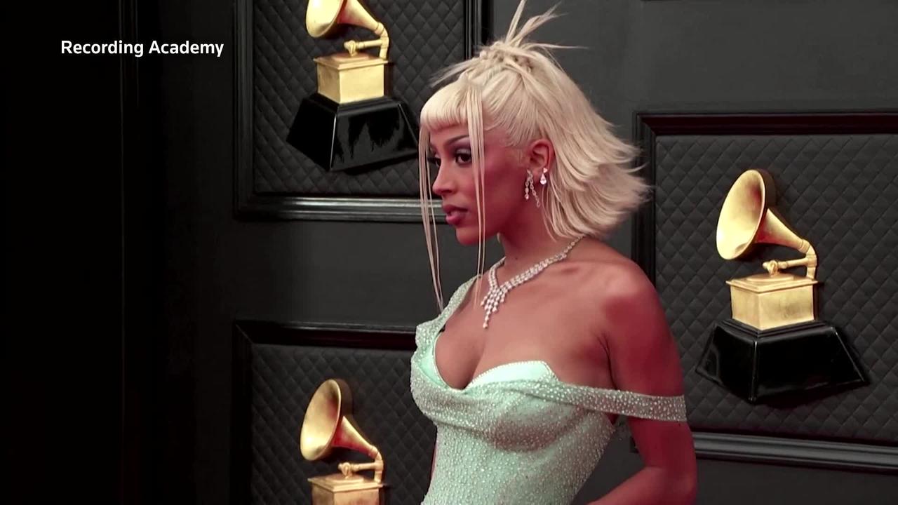 Music's brightest stars shine on Grammys red carpet