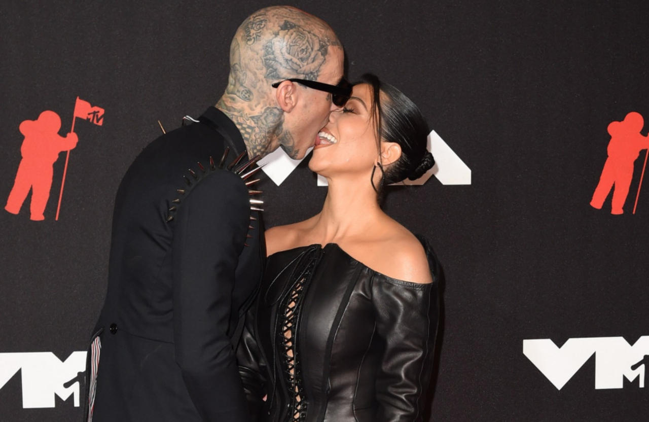 'They just had their team, security and three people that had iPhones: Kourtney Kardashian and Travis Barker 'only had five wedd