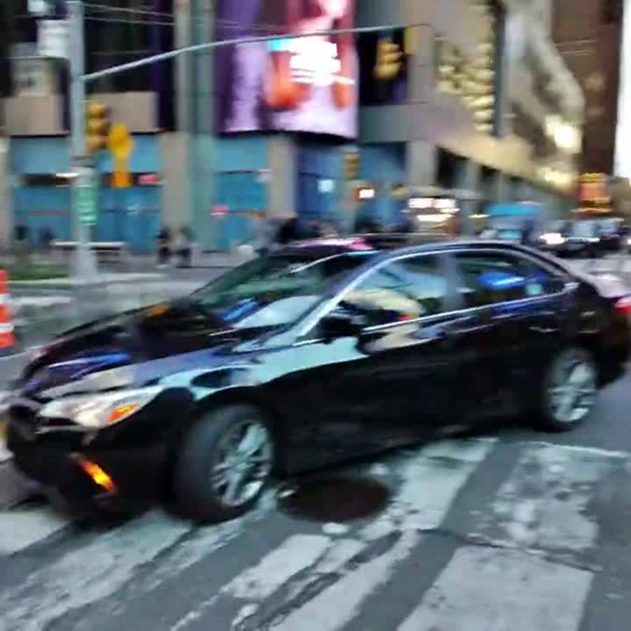 Huge bang / manhole explosion causes panic in New York's Times Square.