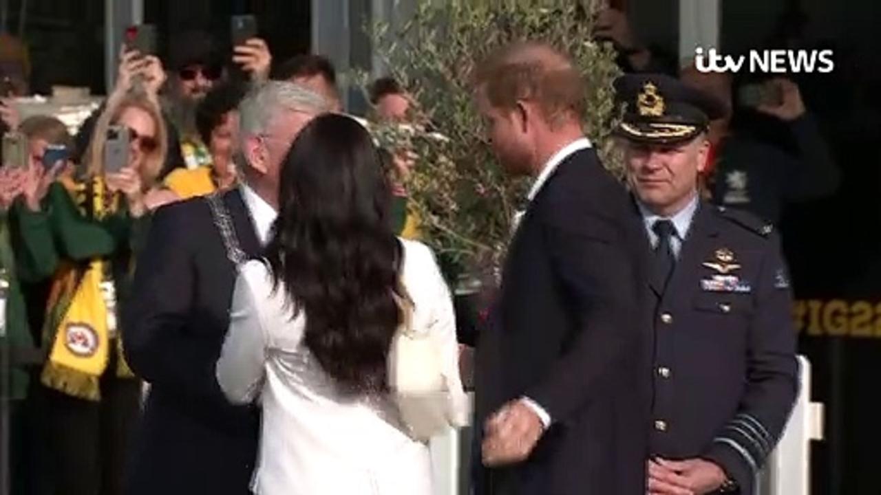 Harry and Meghan arrive ahead of Invictus opening ceremony
