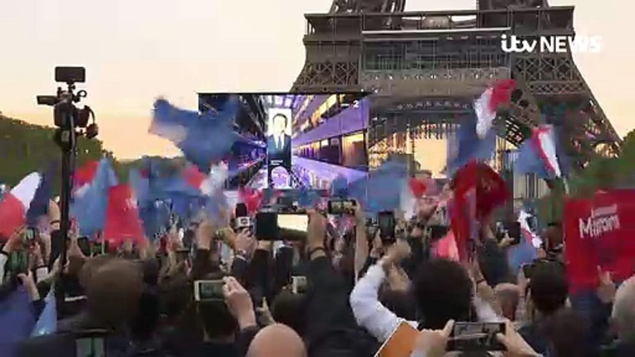 Macron supporters celebrate moment he secures second term