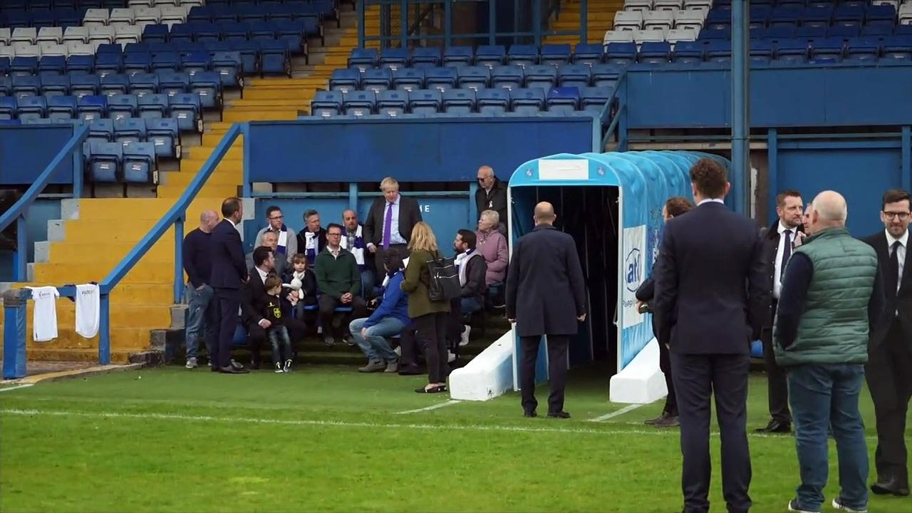 PM hopes to score goal with voters as he visits Bury FC