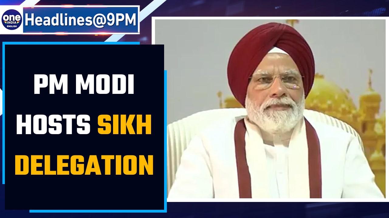 PM Modi hosts Sikh delegation at his Delhi residence; PM wears red turban | Oneindia News