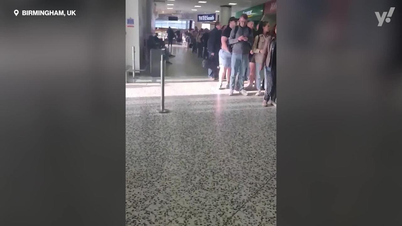 Airline passengers forced to wait outside airport for hours