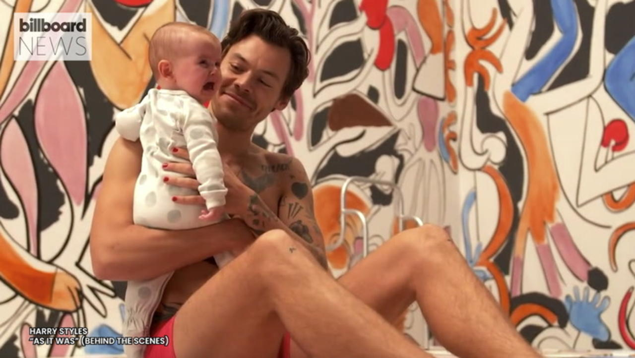 Harry Styles Had the Cutest Moment With a Baby Behind the Scenes of the ‘As It Was’ Music Video | Billboard News