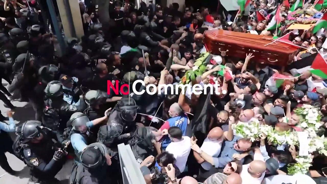Israeli riot police at journalist's funeral procession