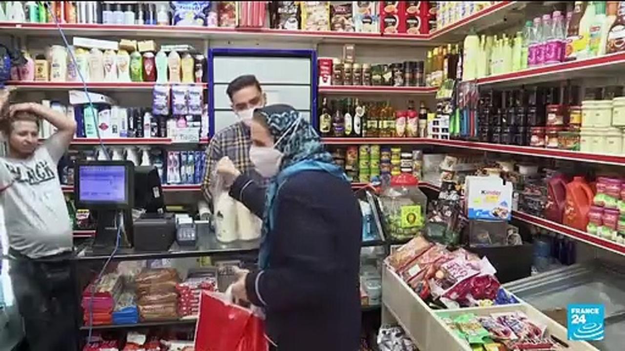 Soaring bread prices spark protests and shop fires in Iran