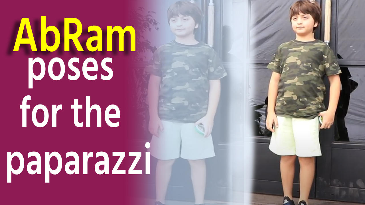 SRKs son AbRam Khan cutely poses for the paparazzi